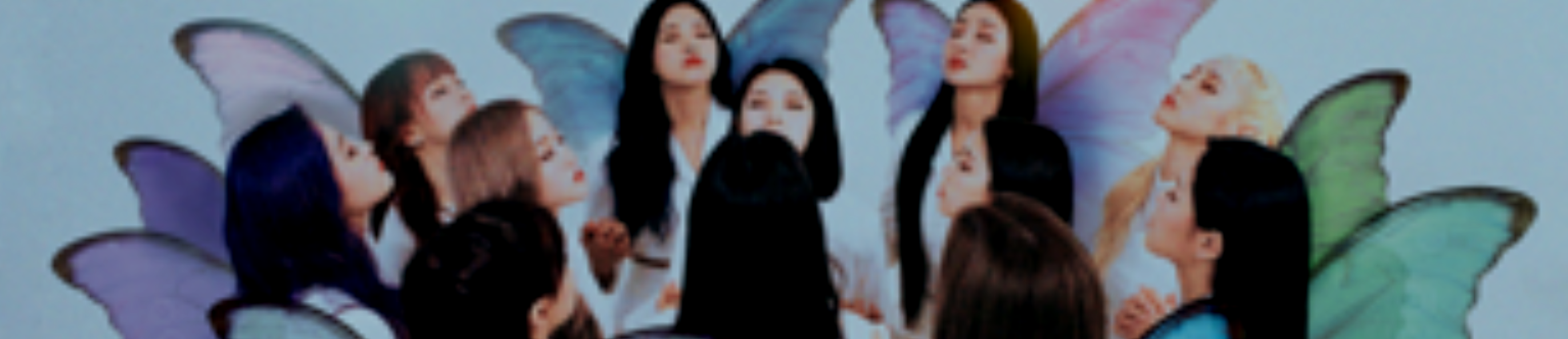 A cropped image of the X X album cover. The members of Loona are sat in a circular formation, holding hands with their eyes closed. They are wearing all white, and all have large butterfly wings on their backs. The background is a soft light blue.